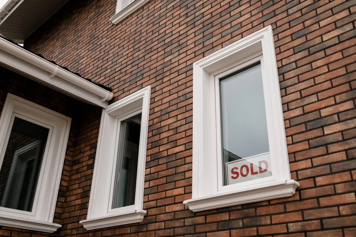 Cardiff HMO investor reviewing property particulars and due-diligence documents before buying an HMO